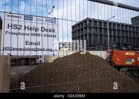 Euston station, London. Sign for HS2 Help Desk Stock Photo