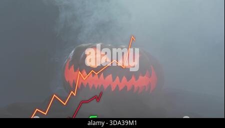 Glowing carved pumpkin on dark base, smoke rising, orange or yellow and red graphs with green marker Stock Photo