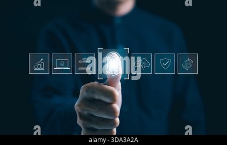 Futuristic biometric authentication technology concept. Man is touching a fingerprint scan with icons of secured access, data protection, network cybe Stock Photo