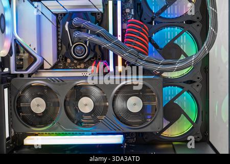High-End Computer Components RGB Lighting and Advanced Cooling Systems Inside View. Stock Photo