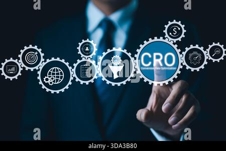 CRO Conversion Rate Optimization Concept. Businessman with digital gear icon represent Conversion Rate Optimization (CRO) technology, business strateg Stock Photo
