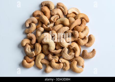 Roasted Cashew Nuts on White Background Stock Photo