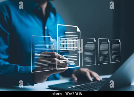 Digital Document Management and Paperless Workflow, Businessman sign virtual documents interface, paperless concept, digital document management. effi Stock Photo