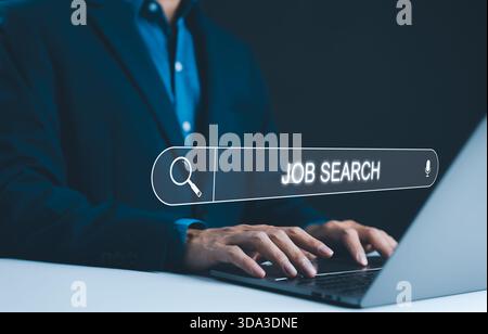 Searching for Job Online. Businessman typing on laptop, with digital job search bar overlay, symbolizing online job search process. online job hunting Stock Photo