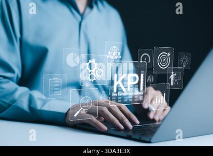 KPI, Analysis key performance indicators, business growth, Businessman using laptop to analyze key performance indicators (KPIs) with icons, data char Stock Photo