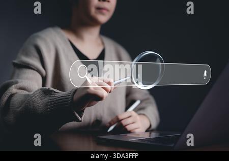 SEO search engine optimization concept. Search bar Interface, Woman using virtual search bar with magnifying glass icon, SEO and search engine Stock Photo