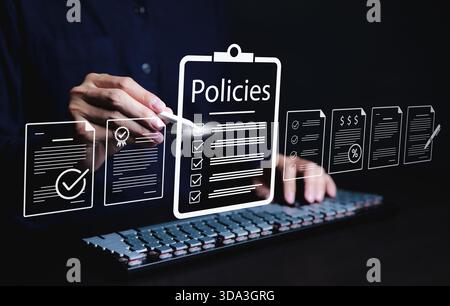 Policy documentation and compliance concept. A person reviews digital document labeled "Policies" with icons, checklists, certifications and financial Stock Photo