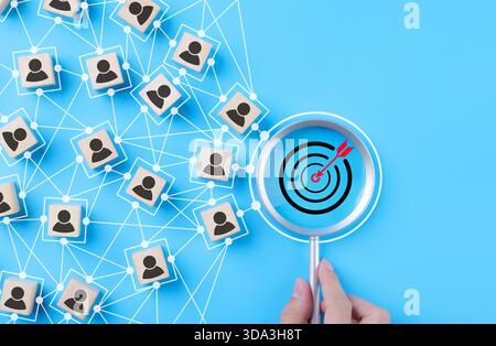 CRM, customer relationship management concept. Customer profile icons connected to target customer relationship management and targeted marketing Stock Photo