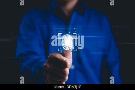 Biometric Authentication and Fingerprint Security Technology. A person uses biometric authentication by scanning their fingerprint, Stock Photo