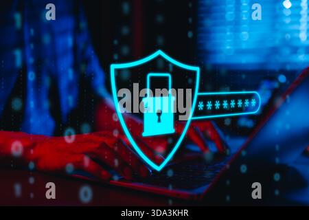 Cybersecurity concept. Hand typing on laptop with glowing padlock and password symbols, cyber security, data protection, and secure online access. Stock Photo