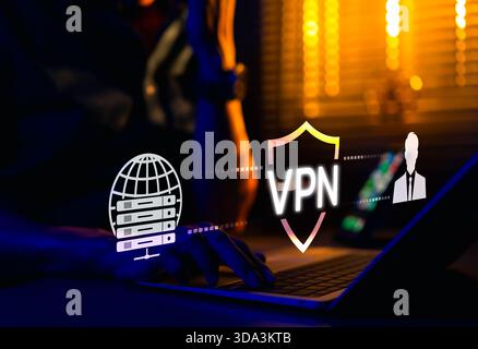 VPN Virtual Private Network. Cybersecurity and data protection concept. Man using laptop with glowing VPN shield icon and digital network graphics. Stock Photo