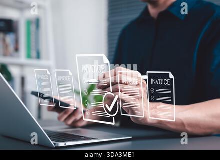 Digital E-Invoice and Billing Management Concept. Businessman using laptop and pen with invoice documents, representing electronic invoicing Stock Photo