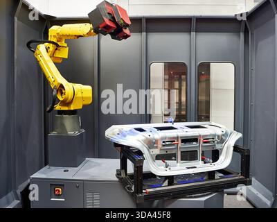 Universal robot with industrial grade 3D scanner non-contact coordinate measuring machine with part Stock Photo