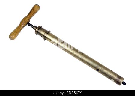 Old bicycle pump created from brass Stock Photo
