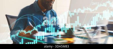 Business Professional Creating Graphs and Analyzing Data in a Modern Office Setting Stock Photo