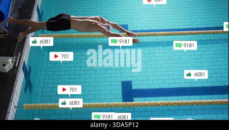 Diving swimmer in black jammers, white cap and goggles over turquoise pool with social icons Stock Photo