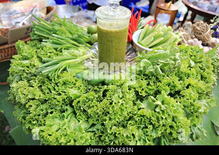 Different green fresh vegetables and herbs for healthy eating with Thai food, many types of fresh vegetables Stock Photo
