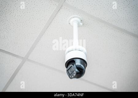 Indoor CCTV monitoring, security cameras inside a meeting room. Stock Photo