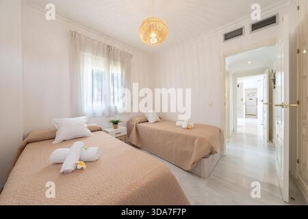 Two Single Beds in a Hotel Room along the mediterranean Stock Photo