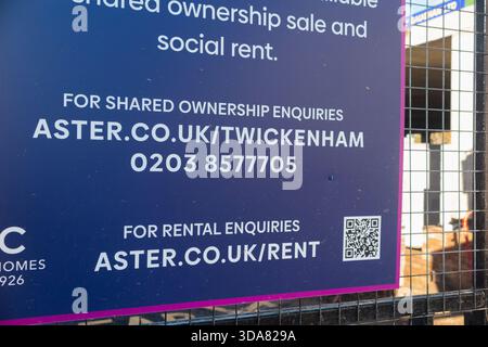 Sign advertising shared ownersip and social housing outside onstruction site & partly built townhouses / housing block / new build / building new homes / apartments / flats. Twickenham. UK. (146) Stock Photo