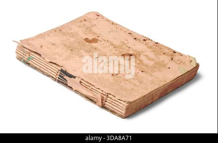 close-up of closed worn vintage book, faded pink cover with brown stains and peeling edges, broken spine exposing binding threads isolated white Stock Photo