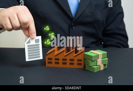 A new contract has been signed with an industrial manufacturer. Agreement and advance payment. Supply chain deals, production planning and corporate p Stock Photo