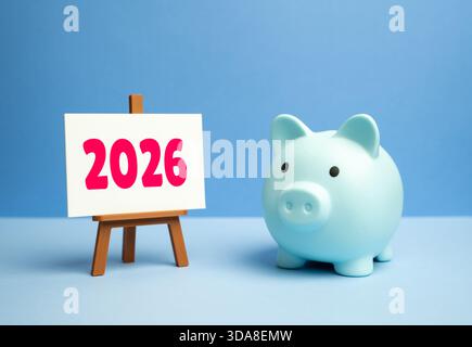 Piggy bank pig and 2026 year. Savings and Investment Strategy for 2026. Financial Forecasts. Budget planning. Financial goals. Business and finance. F Stock Photo