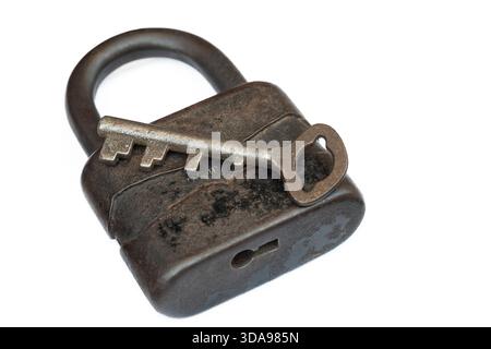 Rusty Old Padlock with Key, Isolated on White Background Stock Photo