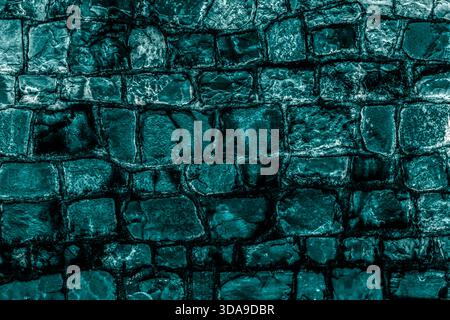 Abstract turquoise stone wall texture. Suitable for backgrounds, graphic design, and architectural illustrations Stock Photo