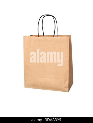 Paper shopping bag isolated on white background. Recycled cardboard bag. Stock Photo