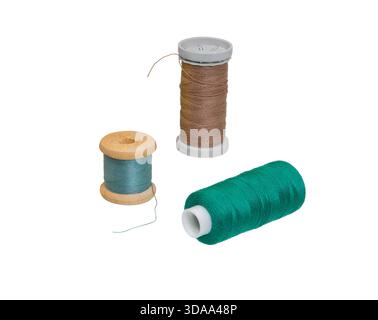 Spool thread collection,  isolated on white background. Set of different sewing spool with threads. Stock Photo