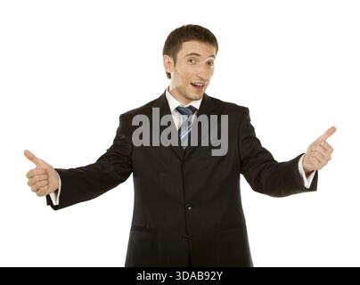 Happy businessman showing his thumb up with smile Stock Photo