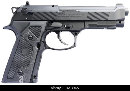 Replica steel handgun isolated on the white Stock Photo