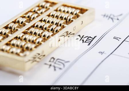Abacus and salary form feature Stock Photo