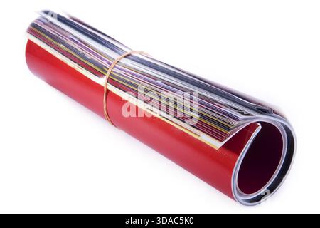 Roll of magazine, isolated on white background Stock Photo