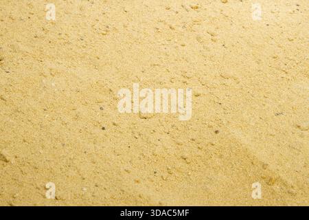 Coarse sand background texture. Macro of coarse sand grains Stock Photo