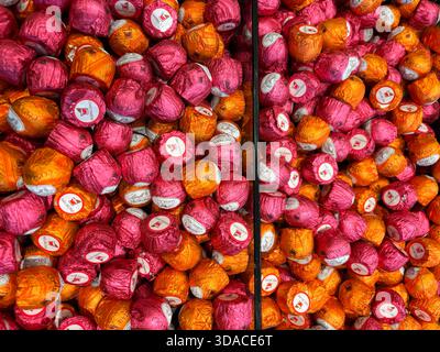 Barberino di Mugello, Italy, December 7, 2025. Lindt Lindor Swiss chocolates truffles assorted flavours in a shop. Colourfully wrapped chocolates. Stock Photo