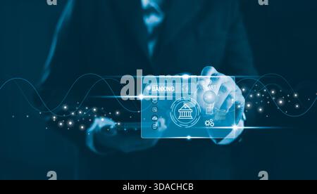 Business professional interacting with futuristic online banking interface, showcasing digital finance technology, secure transactions, fintech innova Stock Photo