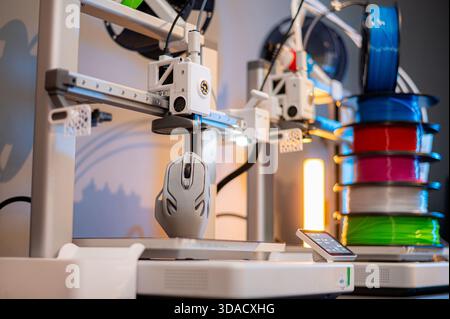 A student man print prototype on 3D printer Stock Photo