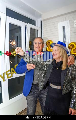 Romantic New Year’s Eve Party for a Senior Couple Stock Photo