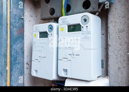 Kilowatt huor smart electric power metters counter measuring power usage modern smart grid residential digital power supply meter Selective focus, clo Stock Photo