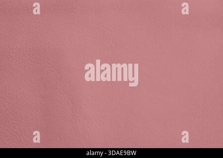 Soft leather texture in elegant Dusty Rose color with subtle natural grain and matte finish. Natural background for fashion design, pastel color Stock Photo