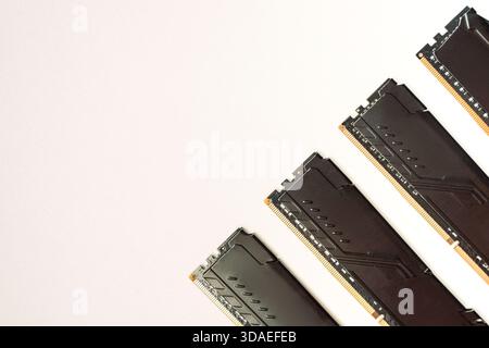Black DDR RAM modules diagonal on white background with copy space Stock Photo