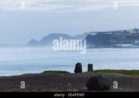 View of the stormy sea on the north coast of Sao Miguel Island. Ribeira Grande, Praia do Monte Verde. Sao Miguel Island, Azores Stock Photo