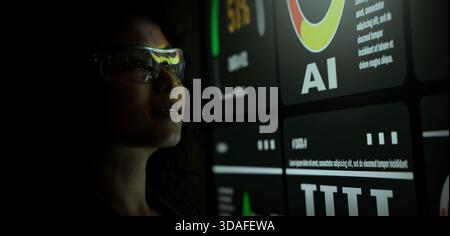 AI Using. Silhouetted analysts interact with a large AI data. AI Display charts graphs and analytics. Business team using futuristic AI interface visu Stock Photo