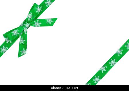 Green Winter Christmas Corner Ribbon Decorated with Snow Flakes Tied in Bow Isolated on White Background, Clipping Path Included Stock Photo