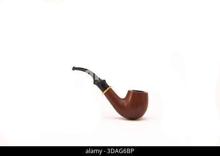 Close-up side view image of a two-tone brown and black smoking pipe on a white background. Stock Photo