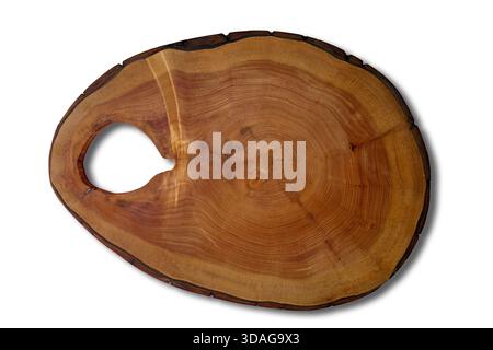 Empty brown cutting board made of wood cut isolated on white background. Stock Photo