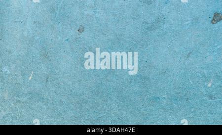Aged and Textured Light Blue Plastic Surface Background: Close-up of Weathered Material with Scratches and Dust Stock Photo