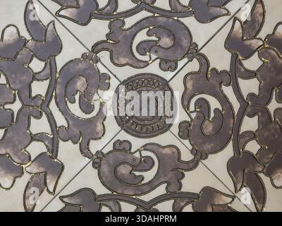 Close up of an elegant antique vintage pattern. This seamless background design with abstract floral ornament has classic, timeless feel. intricate te Stock Photo